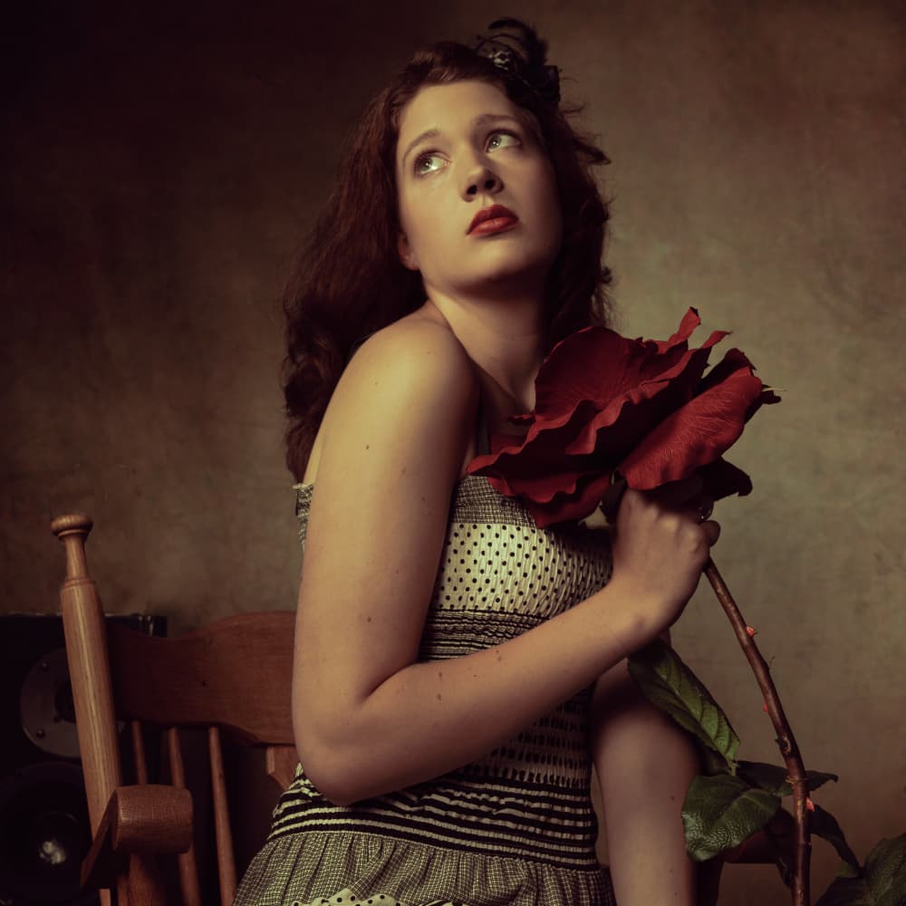 Pensive Woman Red Rose by Ineke Mighorst — canvas wall art