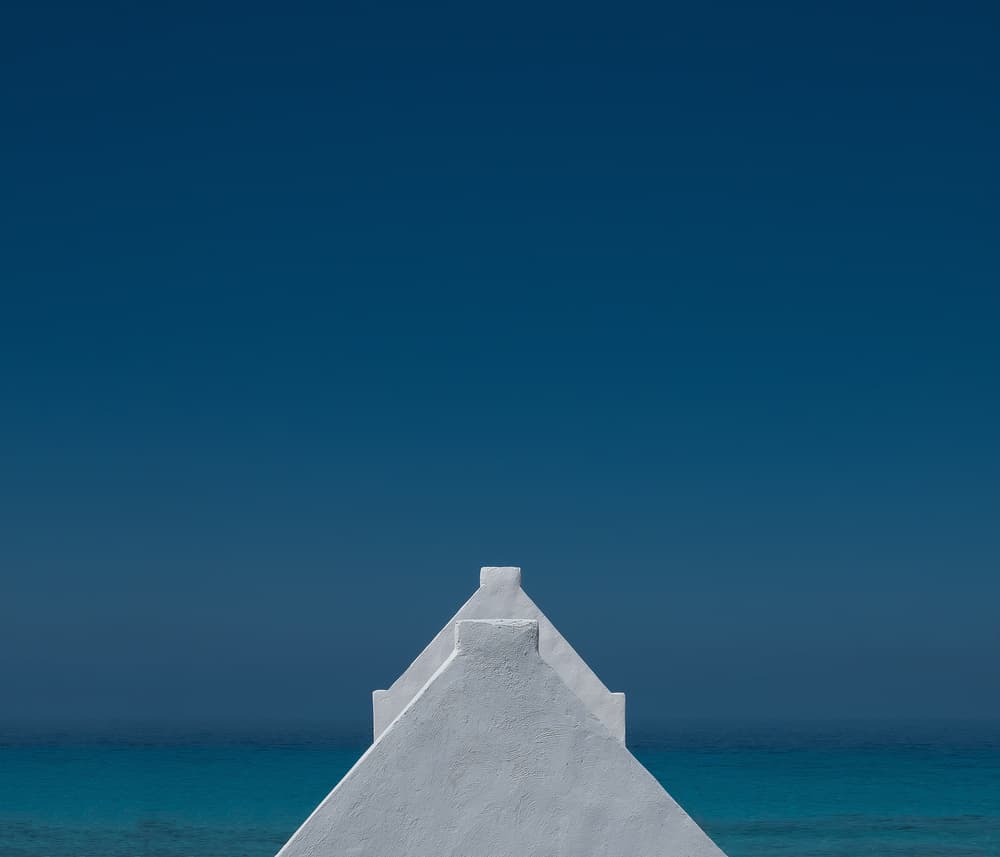 White Architecture Blue Sea by Rolf Endermann — canvas wall art