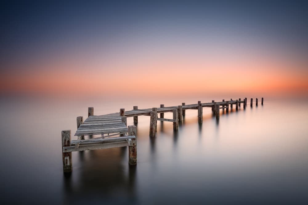 Broken Pier Sunset by Jose Beut — canvas wall art