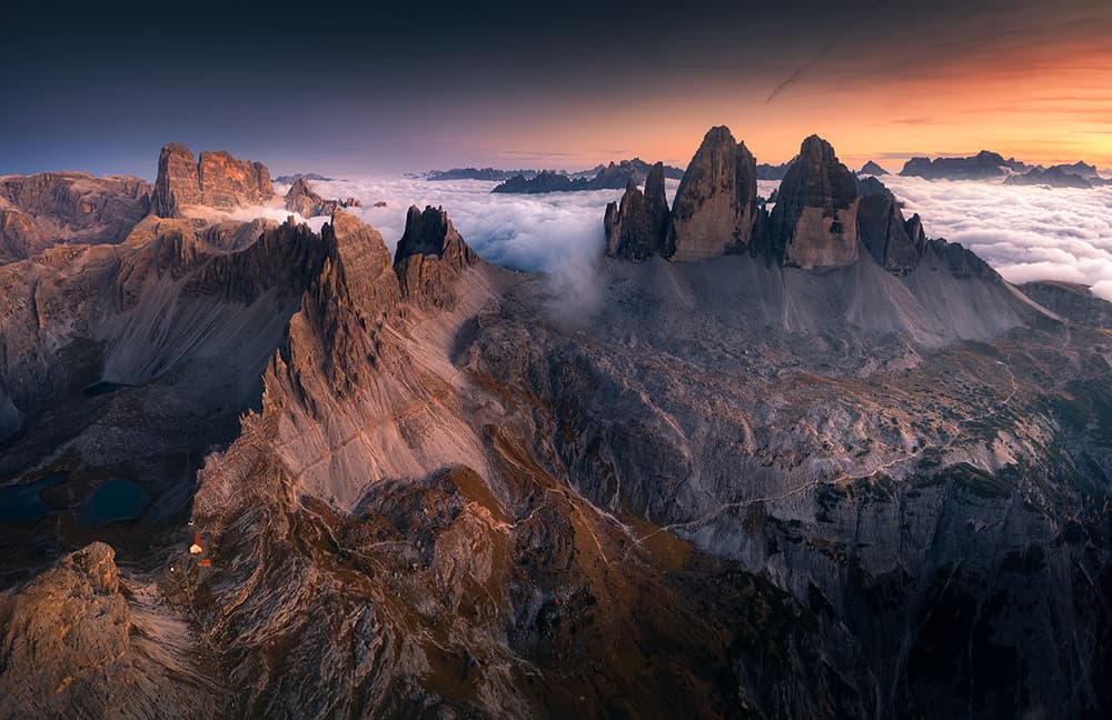Majestic Peaks Above Clouds by Karol Nienartowicz — canvas wall art