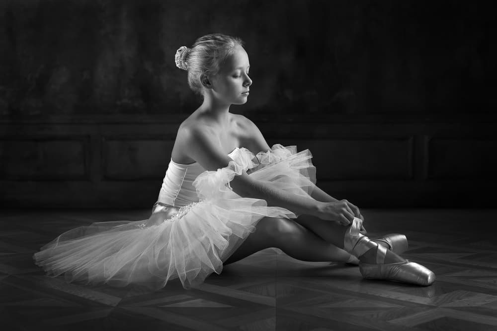 Ballerina Preparing Pointe Shoes by Victoria Glinka — canvas wall art