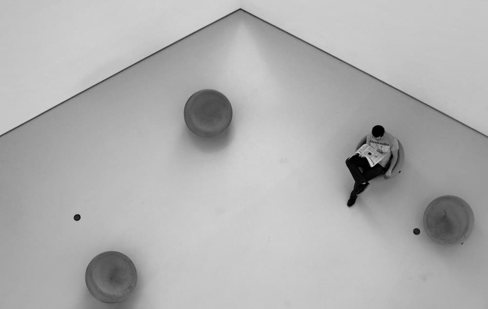 Man Reading Overhead by Olinda Coutinho — canvas wall art