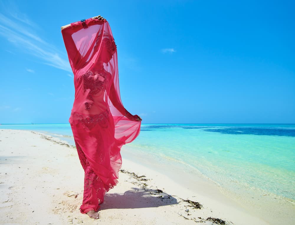 Red Veil Tropical Beach by Dmitriy Aychuvakov — canvas wall art