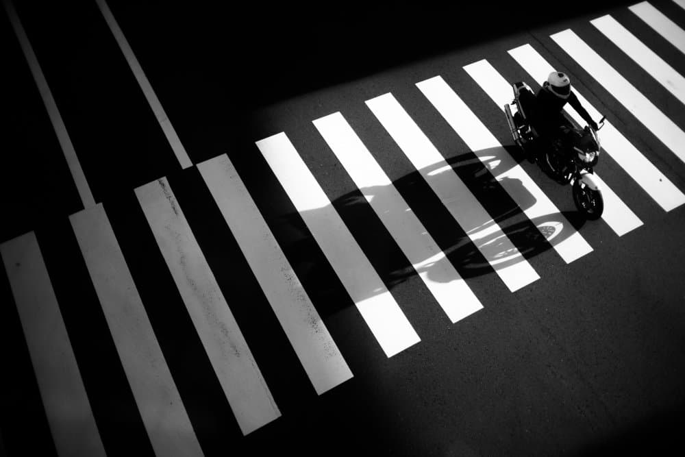 Motorcycle on Zebra Crossing by Satoshi Hata — canvas wall art