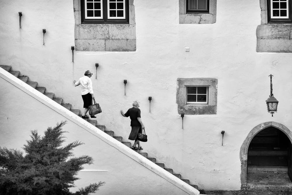 Women On Stone Stairs by Abilio Silveira — canvas wall art