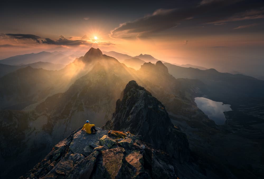 Hiker At Golden Sunset by Karol Nienartowicz — canvas wall art