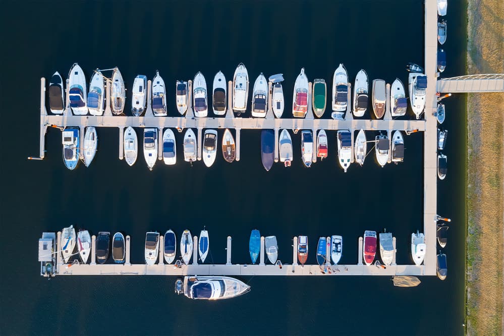 Boats In A Marina by Bernardine de Laat — canvas wall art