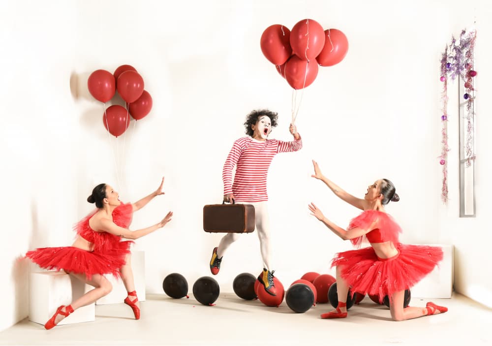 Red Balloons Dance by Rawisyah Aditya — canvas wall art