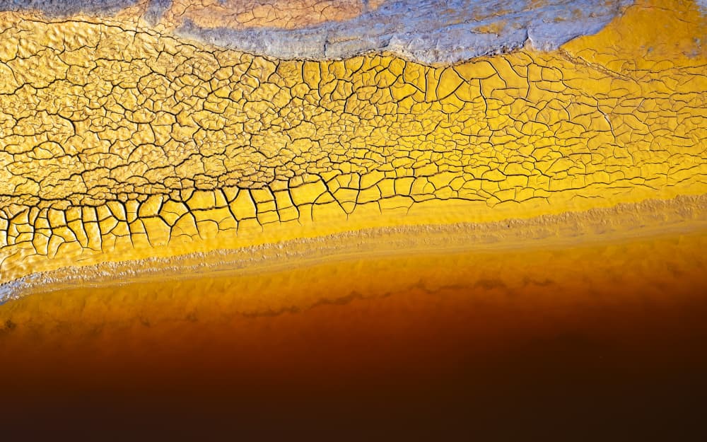 Yellow Cracked Earth by JUAN CARLOS HERVÁS MARTÍNEZ — canvas wall art