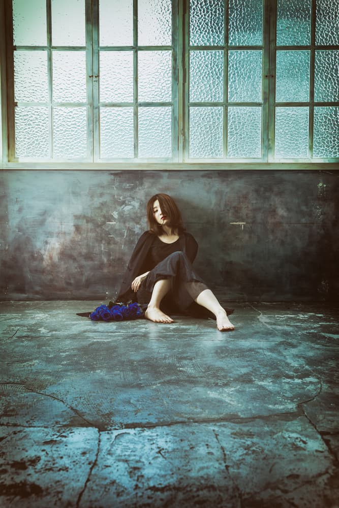 Pensive Woman By Window by Daisuke Kiyota — canvas wall art