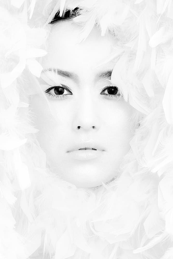 Ethereal Feathered Portrait by David McCracken — canvas wall art