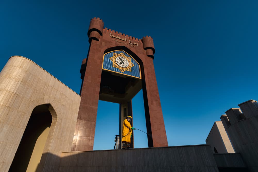 Yellow Suit Clock Tower by Haitham AL Farsi — canvas wall art