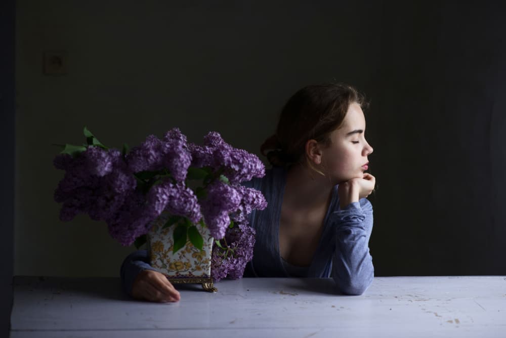 Contemplative Woman with Lilacs by Małgorzata Masarz — canvas wall art