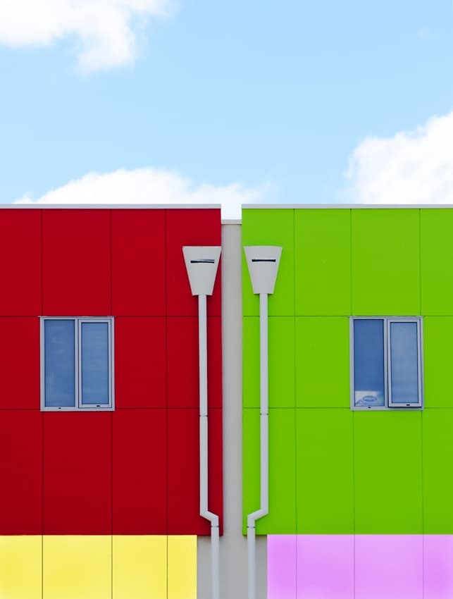 Modern Color Block Building by Wayne Pearson — canvas wall art