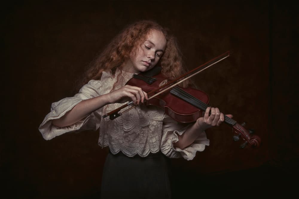 Thoughtful Violin Player by Carola Kayen-Mouthaan — canvas wall art