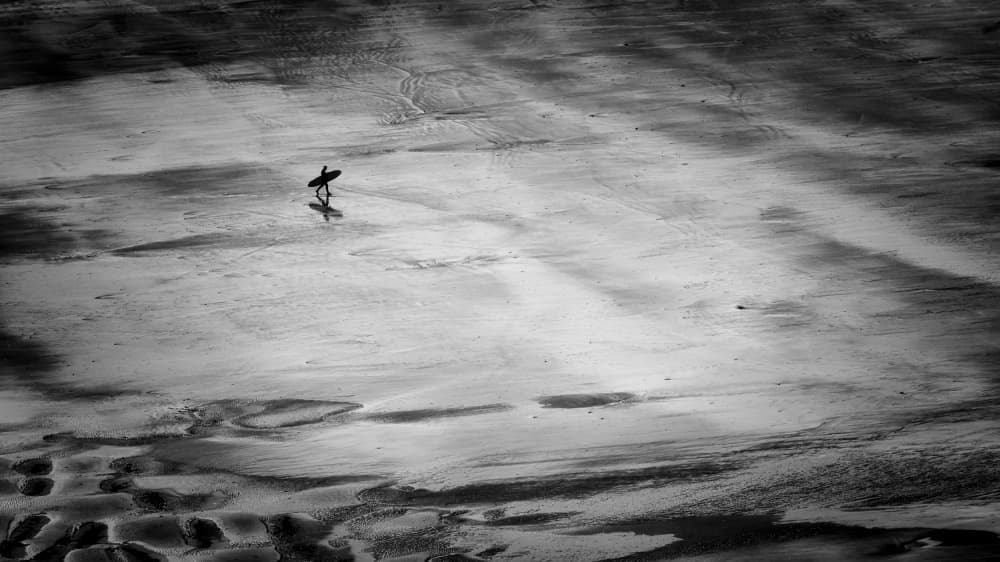Lone Surfer Beach Walk by Richard Bland — canvas wall art