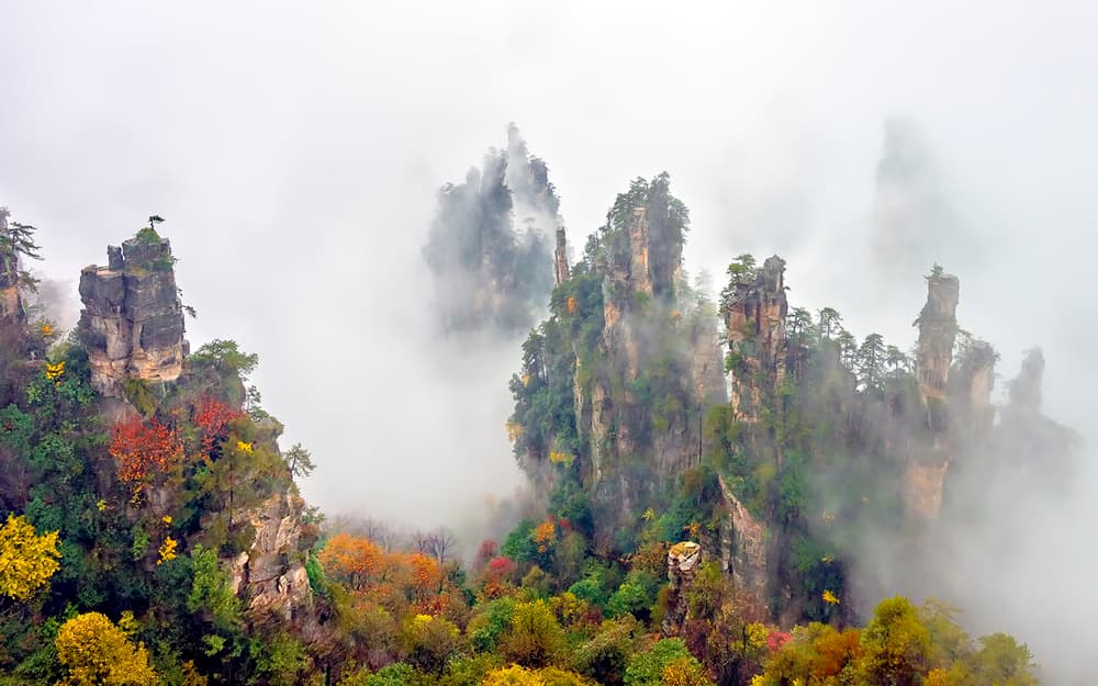 Misty Autumn Mountain Peaks by Hua Zhu — canvas wall art