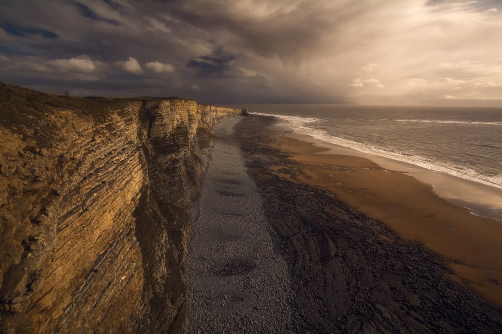 Golden Light Coastal View by Milos Lach — canvas wall art