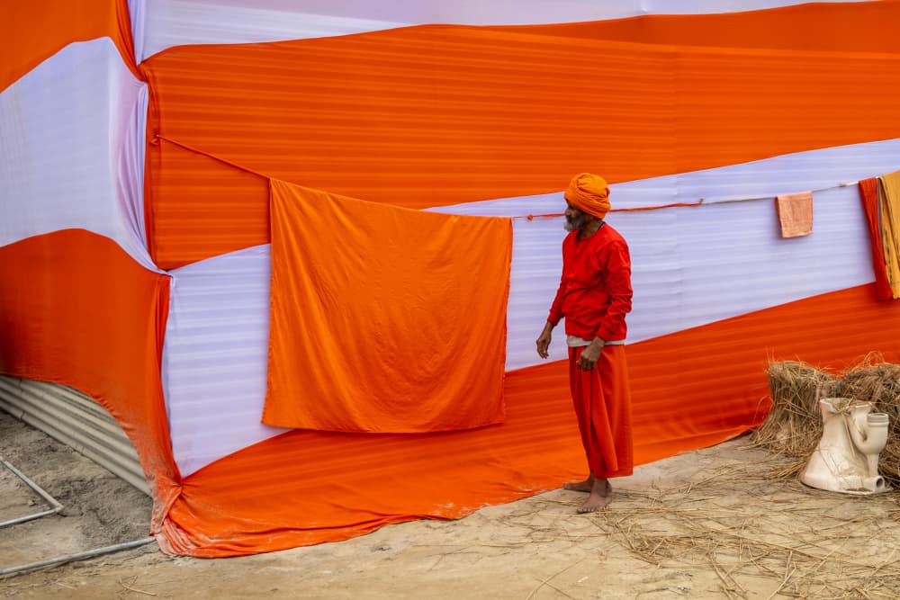 Orange Robes and Tent by ADIREK M — canvas wall art