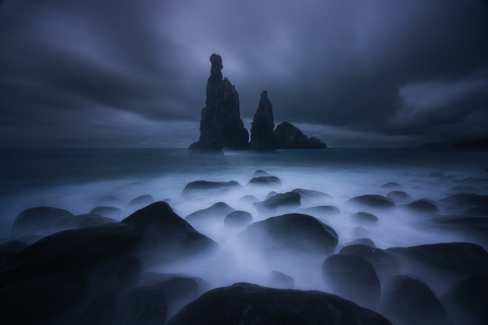 Misty Sea Stacks by Junbo Liang — canvas wall art