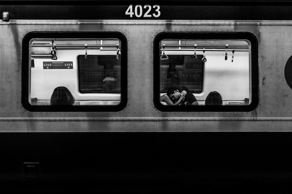 Sleeping Couple Train Window by Camilo Otero — canvas wall art