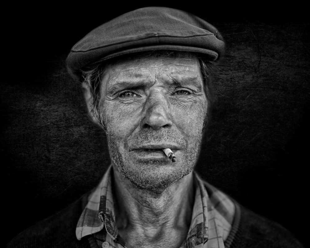 Weathered Man Smoking by Rui Ribeiro — canvas wall art