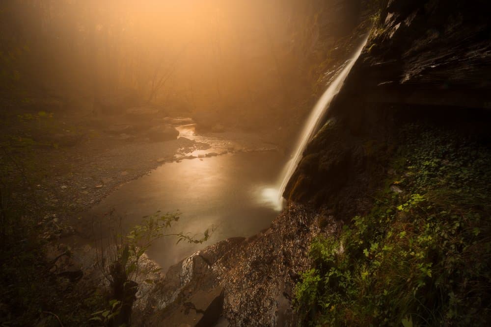 Tranquil Waterfall Glow by Filippo Manini — canvas wall art
