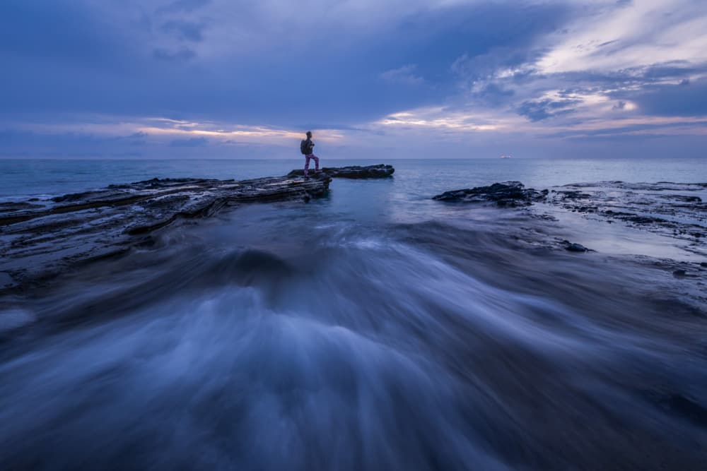 Lone Figure Seascape by Irene Wu — canvas wall art