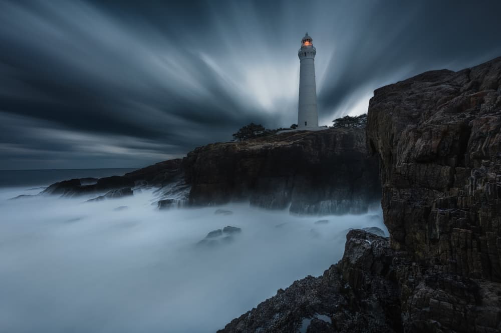 Beacon on a Rugged Coast by Daiki Kuroda — canvas wall art
