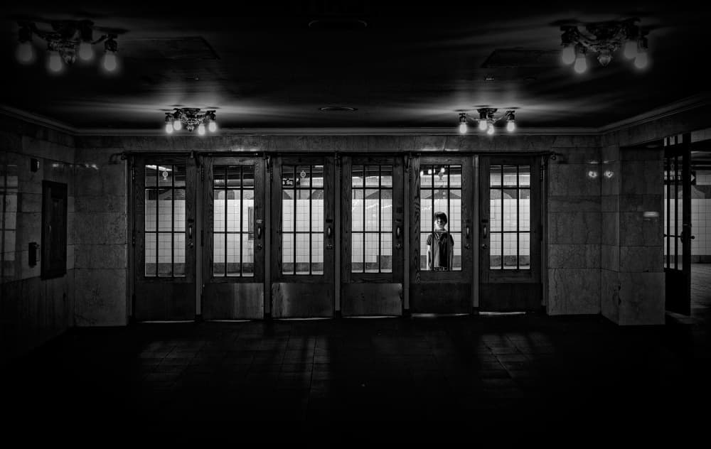 Lonely Man Subway Doors by Wim Schuurmans — canvas wall art