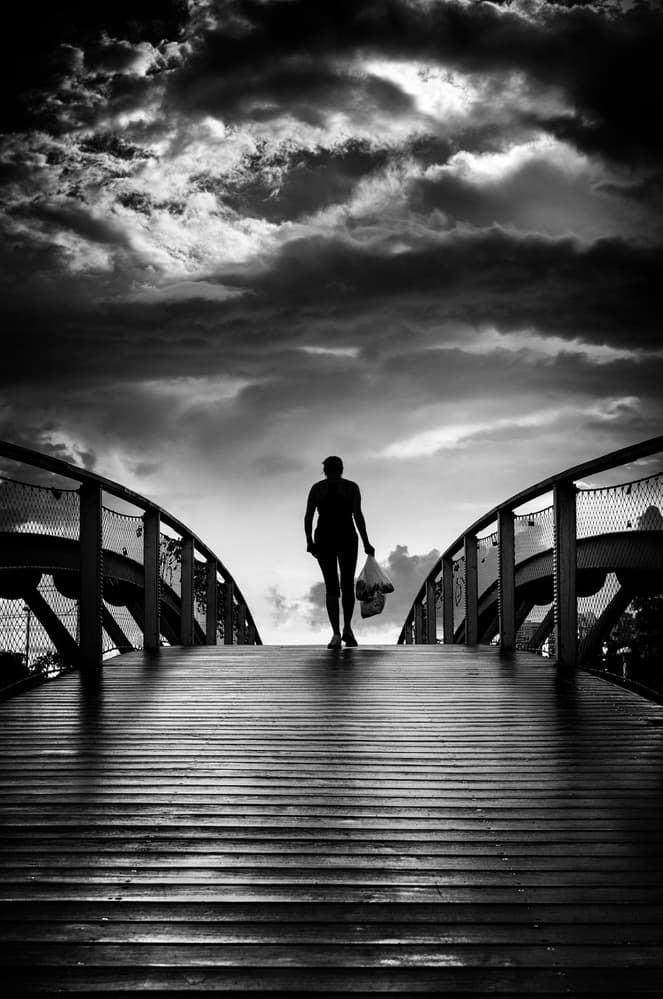Stormy Bridge Walk by Tomer Eliash — canvas wall art