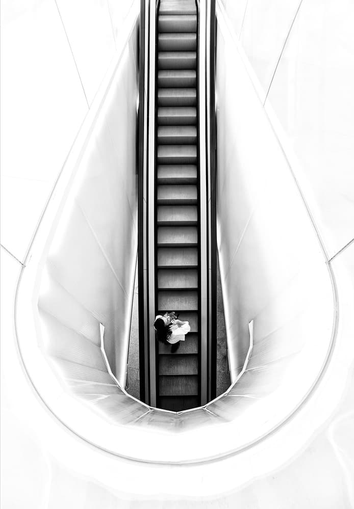 Modern Escalator Perspective by Carlos Costa — canvas wall art