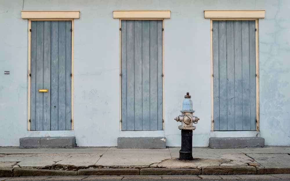 Faded Blue Facade by JONATHAN VARJABEDIAN — canvas wall art