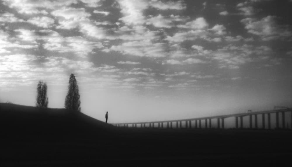 Solitary Figure Cloudy Sky by Paulo Abrantes — canvas wall art