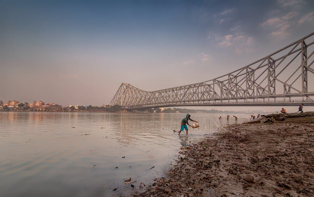 Howrah Bridge River Scene by Vivek Kalla — canvas wall art