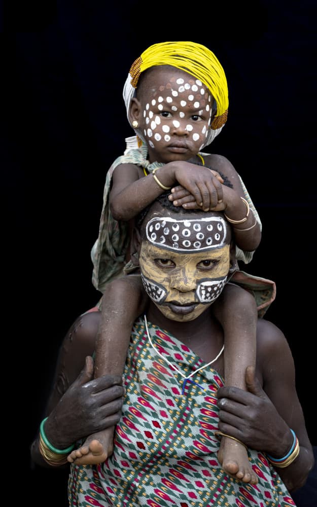 Mother Child Painted Faces by Iris Wiener — canvas wall art
