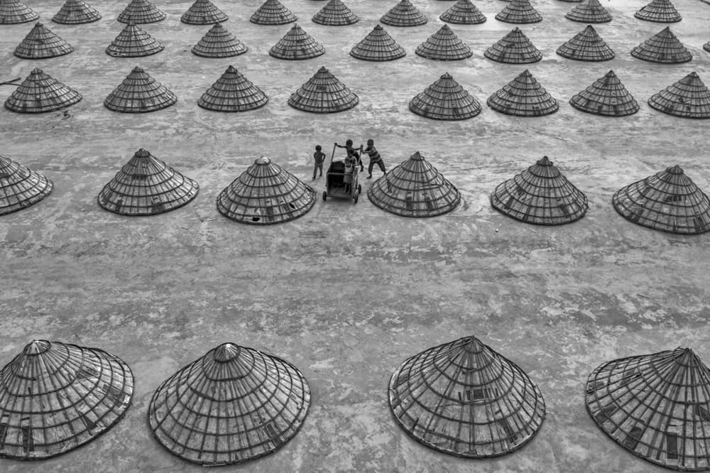 Hats and Little Workers by Azim Khan Ronnie — canvas wall art