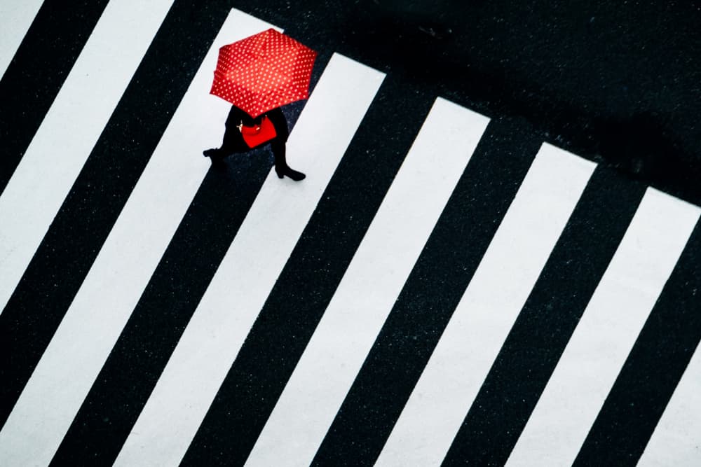 Red Umbrella Crosswalk by Yuzo Fujii — canvas wall art