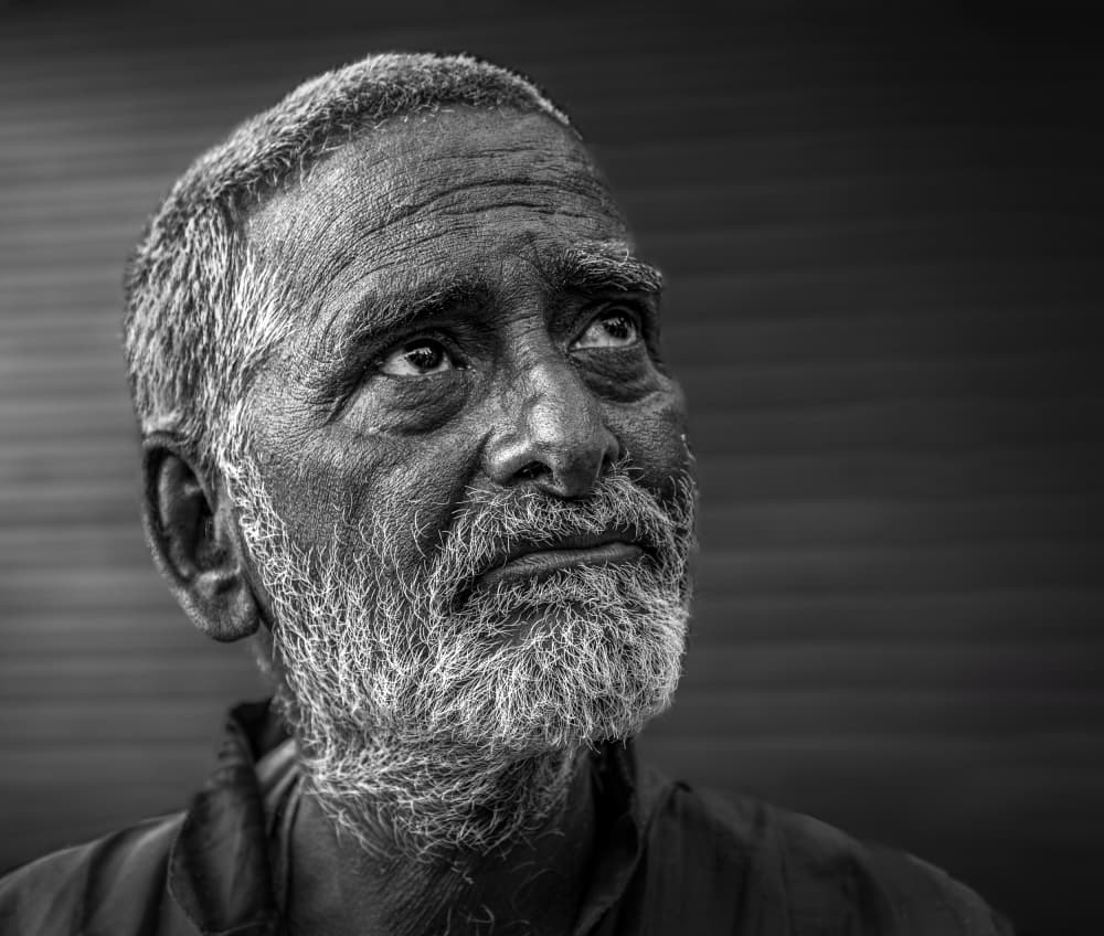 Contemplative Old Man by Anita Singh — canvas wall art