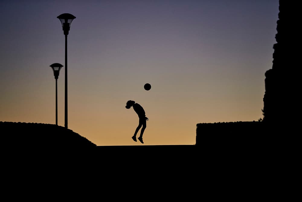 Twilight Soccer Silhouette by Luís Godinho — canvas wall art
