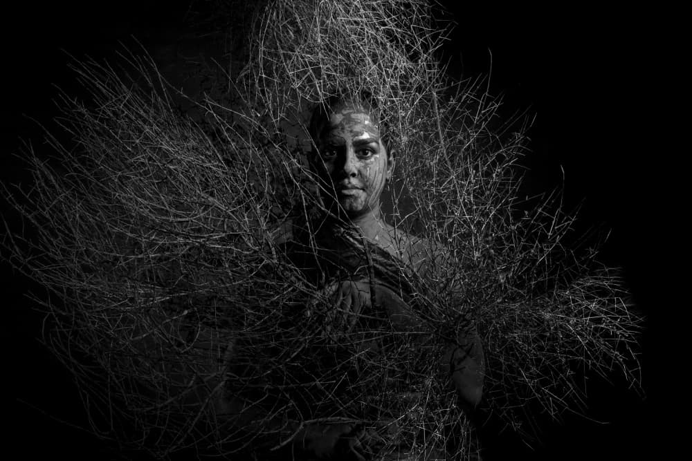 Tribal Woman Amidst Thorns by Mitra Bahmani — canvas wall art