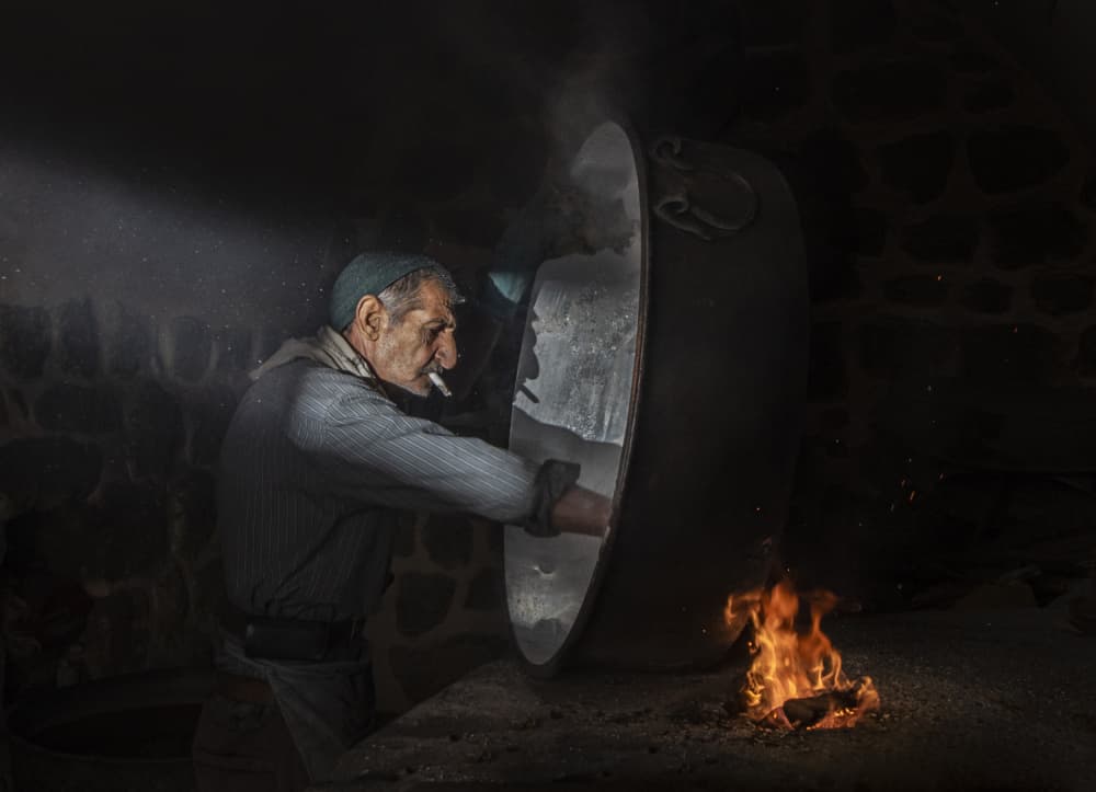 Old Man Working Fire by Ali Can — canvas wall art