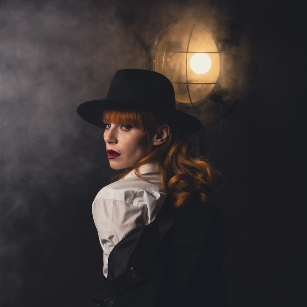 Mysterious Woman In Hat by Gila Koller — canvas wall art