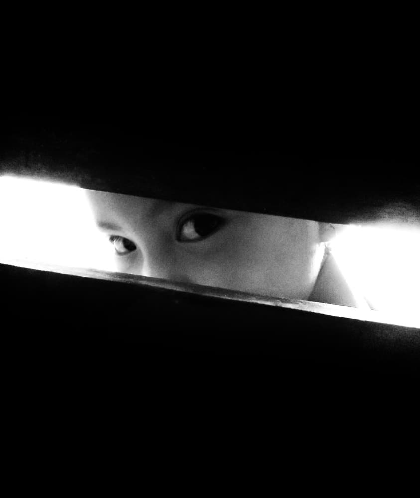 Child's Curious Peek by Kahar Lagaa — canvas wall art