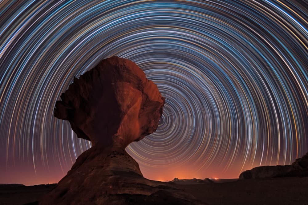 Balanced Rock Star Trails by Vikas Chander — canvas wall art