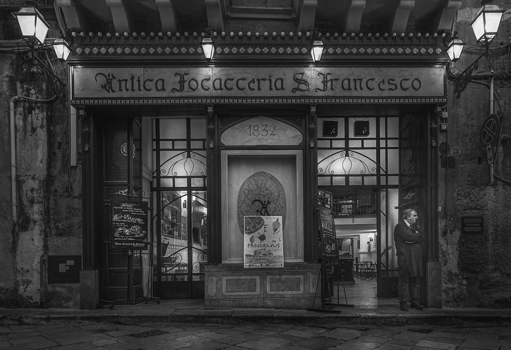 Historic Shopfront Night Scene by Eugenio Pastor Benjumeda — canvas wall art