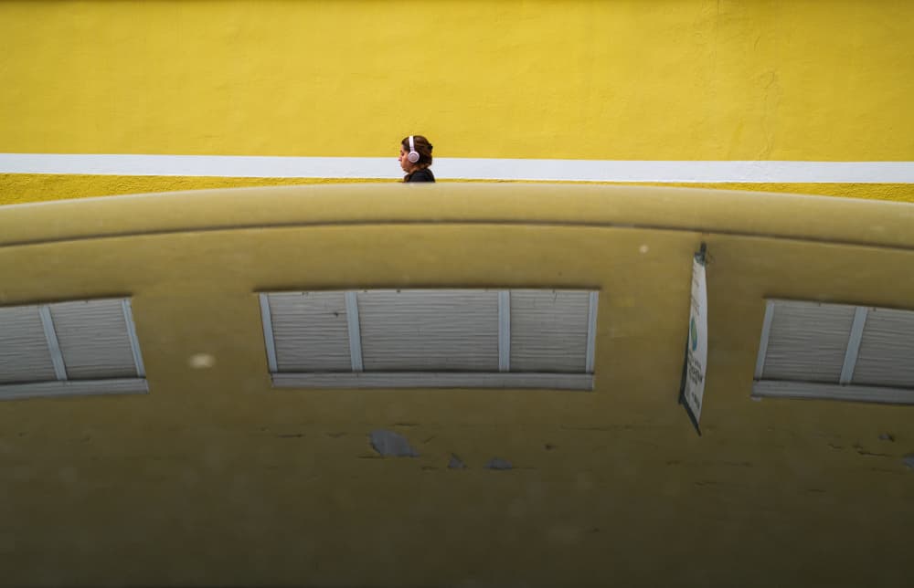 Yellow Wall Listener by Ali Ayer — canvas wall art