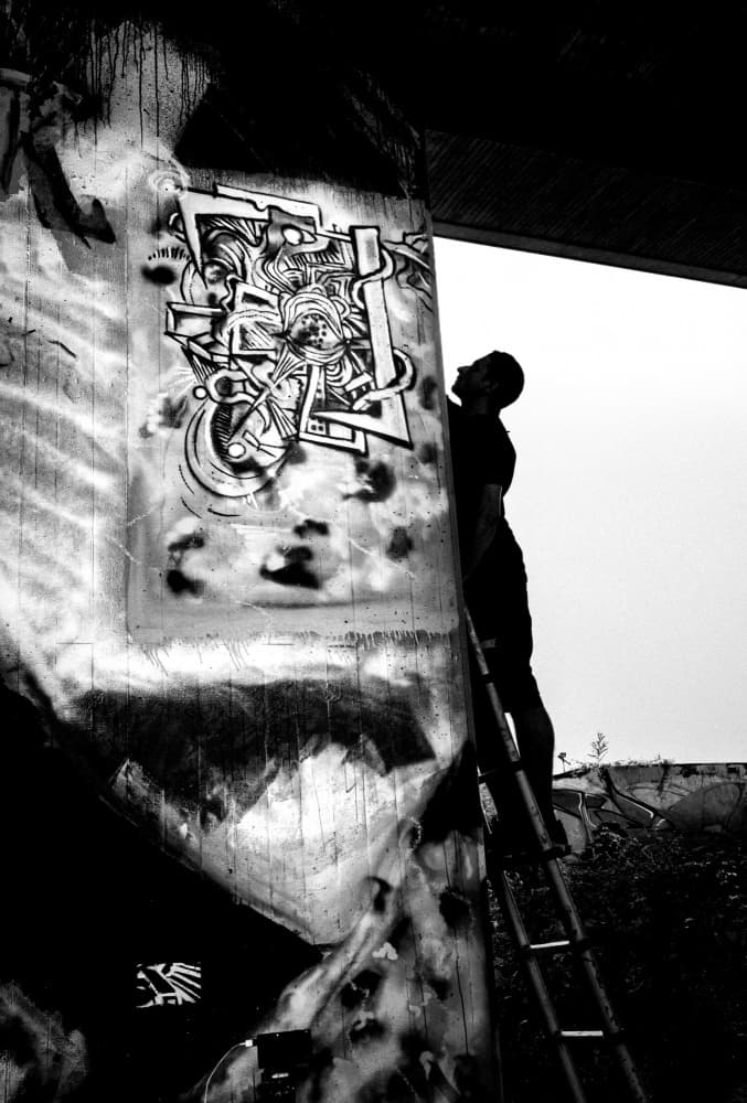 Graffiti Artist At Work by Adam Street Photographer — canvas wall art
