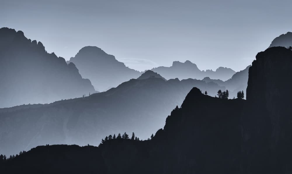 Layered Blue Mountains by Uschi Hermann — canvas wall art