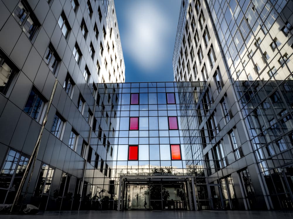 Reflective Red Windows by Udrea Dan — canvas wall art